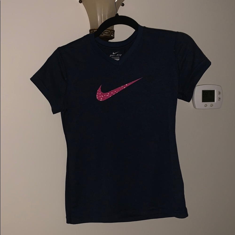 navy blue nike t-shirt with pink nike sign